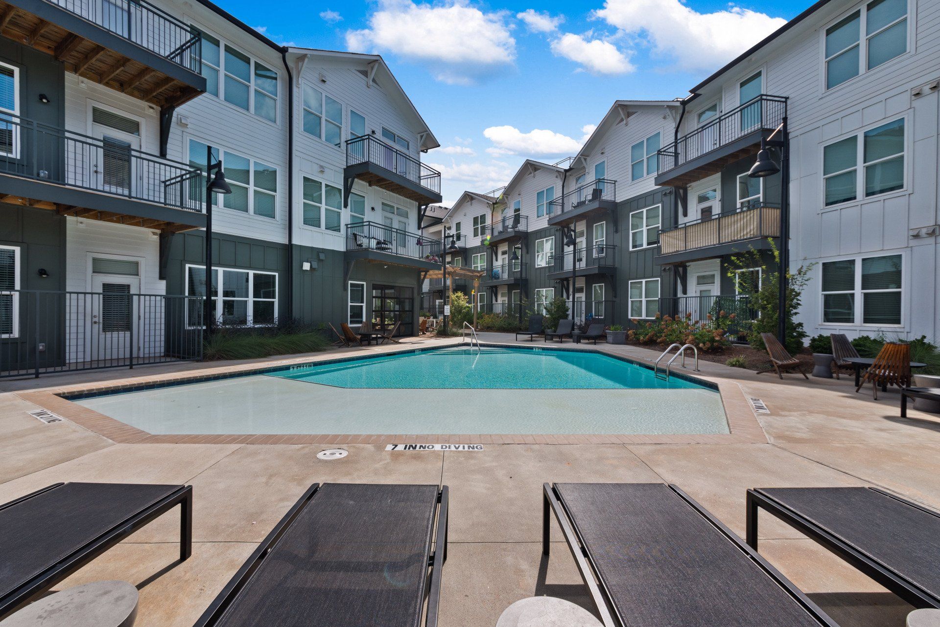 A large swimming pool in the middle of a building
