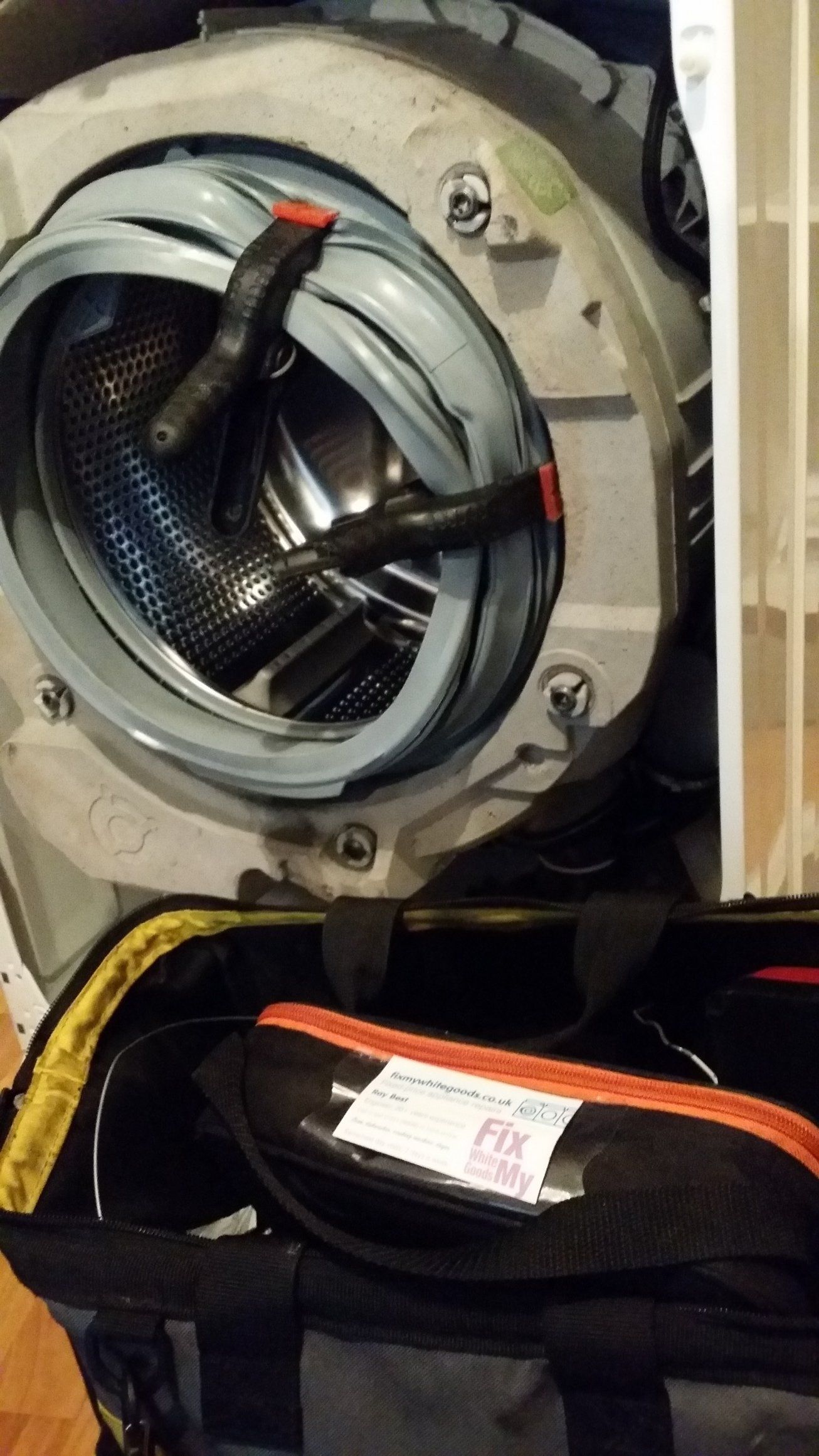 Washing machine door seal being replaced