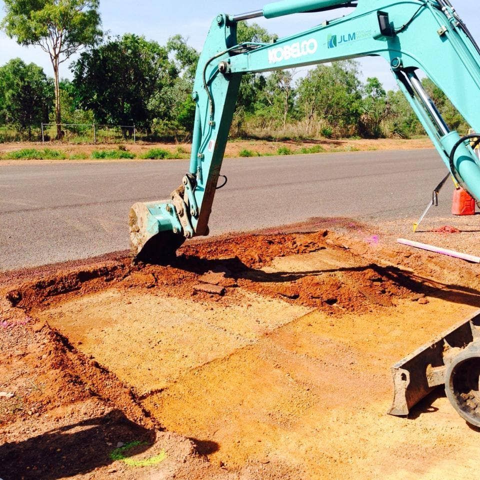 Light Blue Excavator — JLM Contracting Services Pty Ltd in Virginia, NT