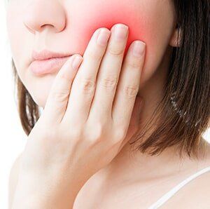 Girl Having a Toothache — Gum Disease in Deerfield Beach, FL