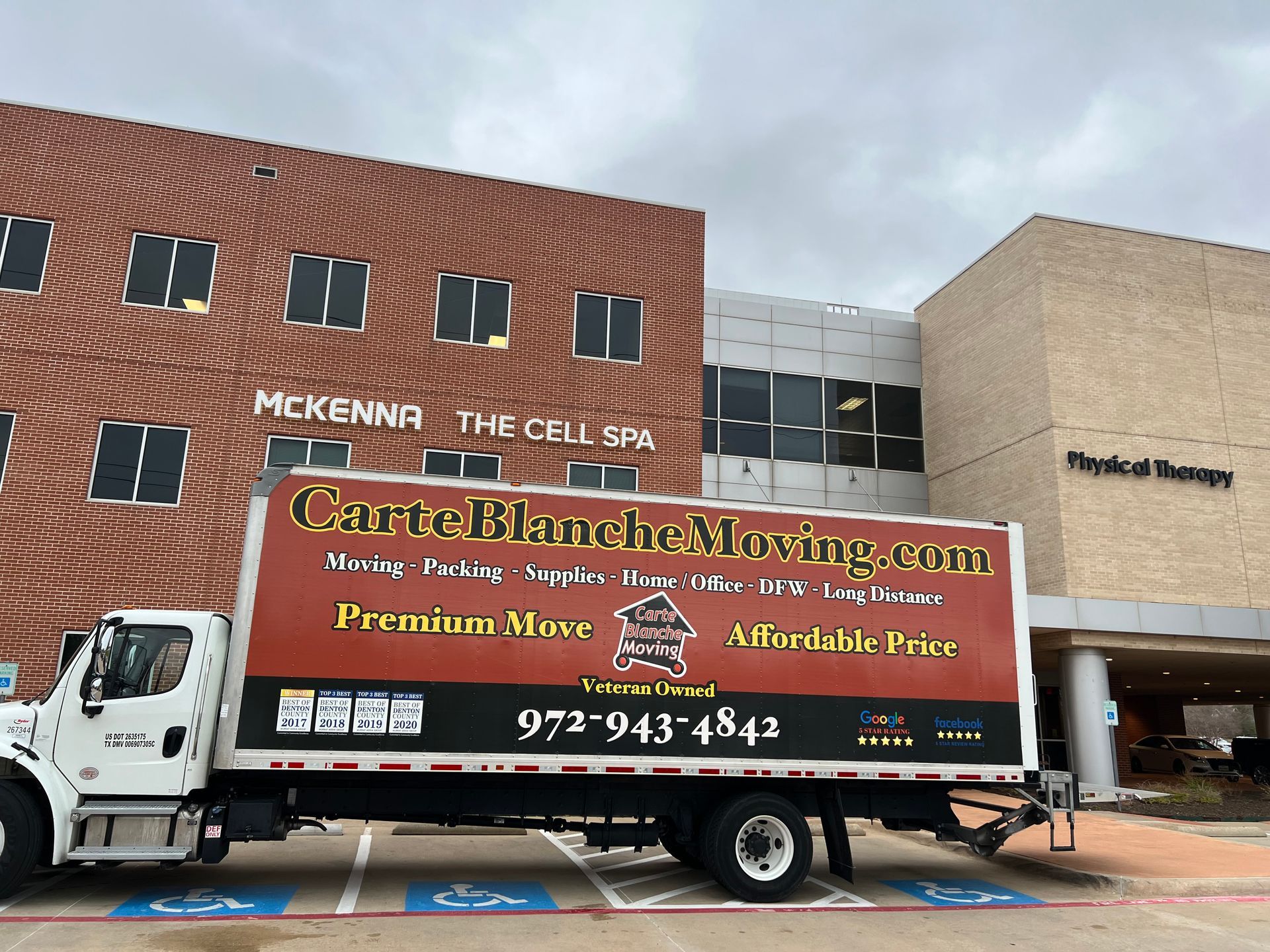 Four workers in movers Flower Mound