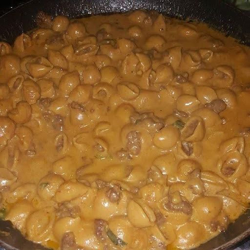 A close up of a pan filled with macaroni and cheese