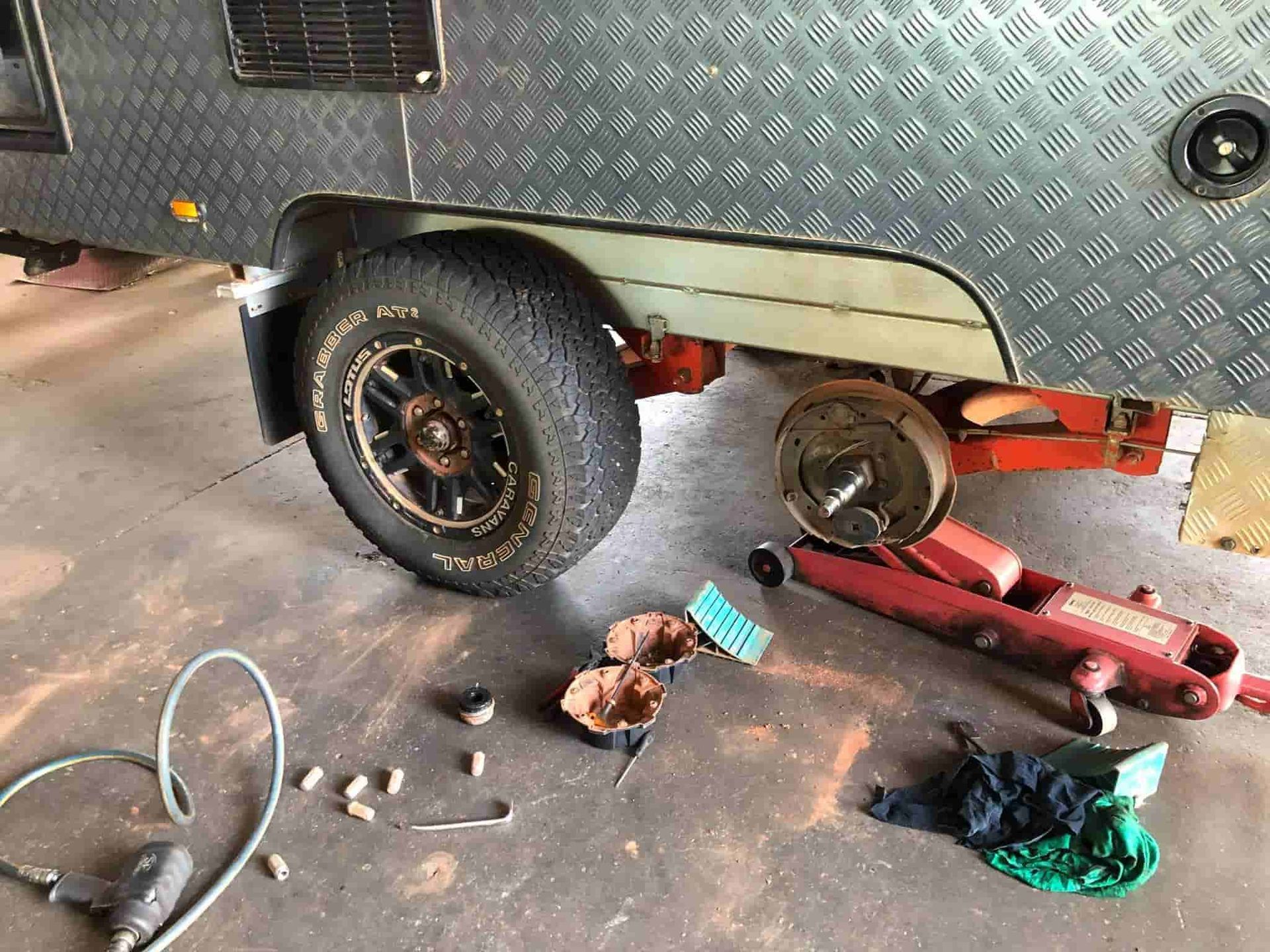 A Trailer in A Garage under Maintenance — Torque Tyres & Trailer Spares Cairns in Cairns, QLD
