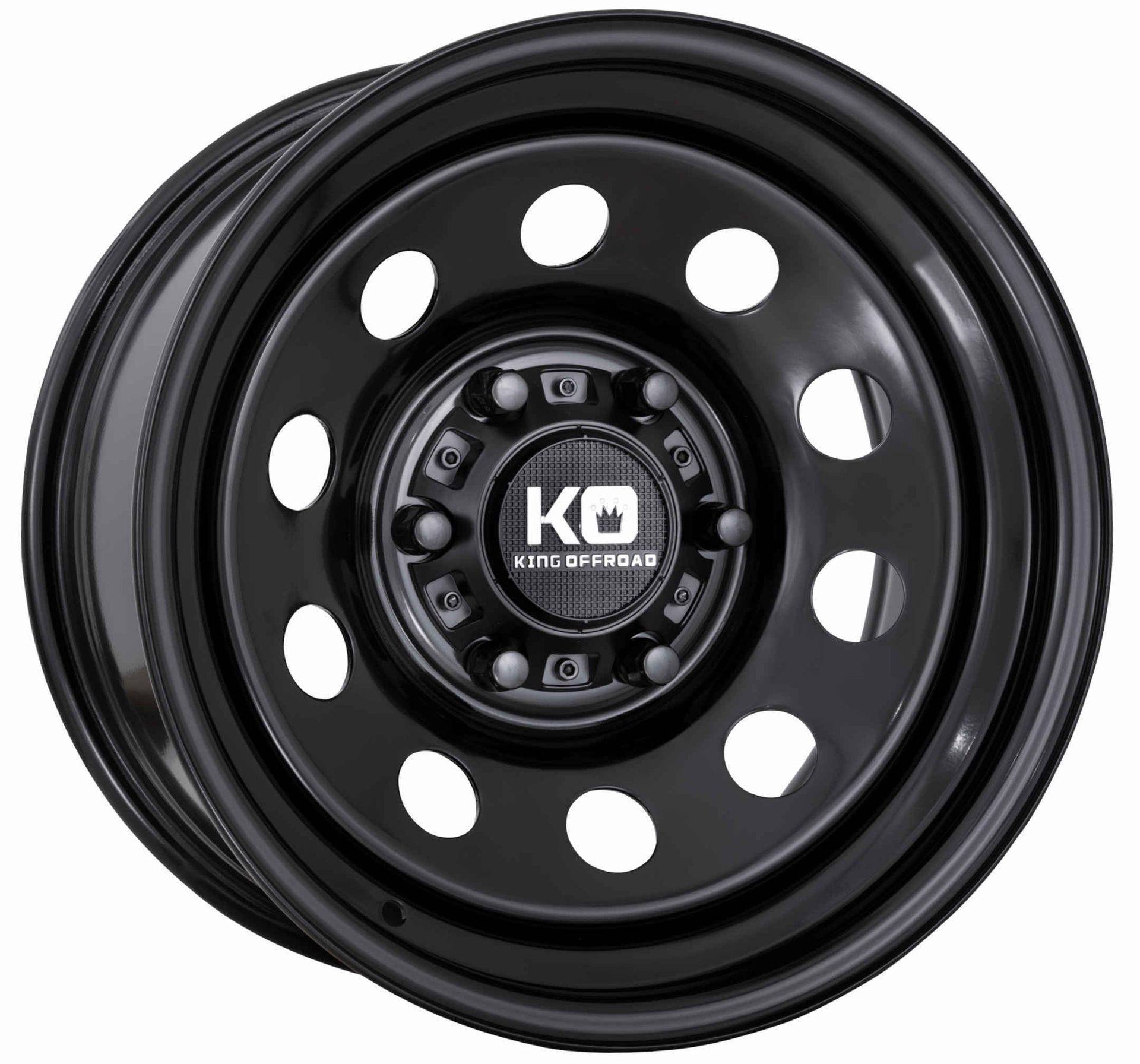 A close up of a black wheel on a white background.