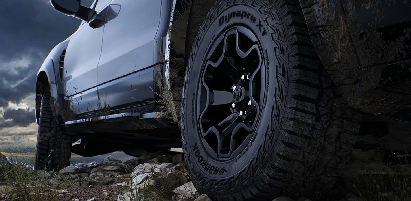 A pair of wheels are sitting on top of a rock.