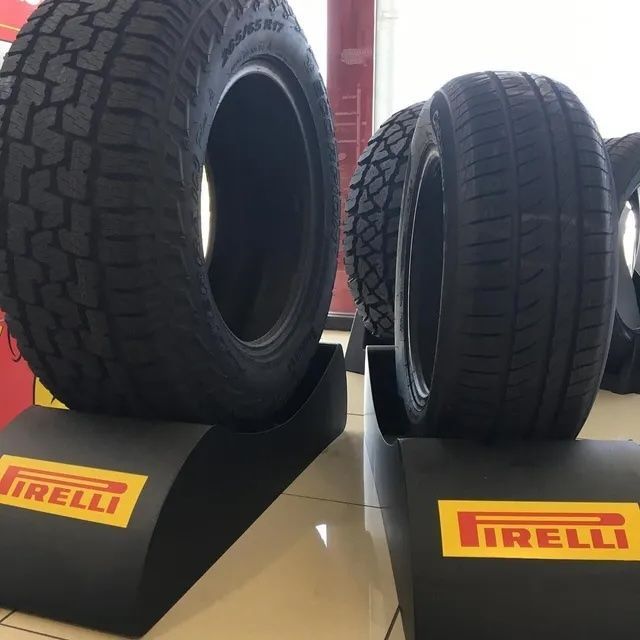 A white wheel with holes in it and a red rim