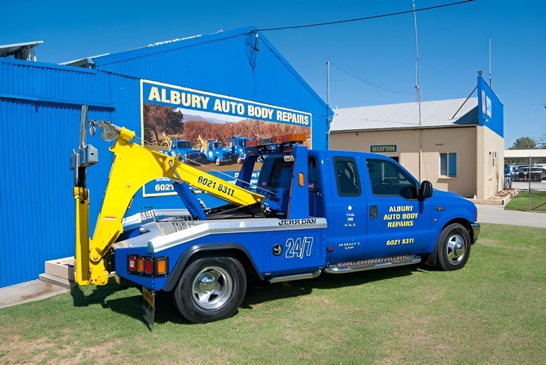 A Blue Tow Truck is Parked in Front of a Building  — Crossborder Towing in South Albury, NSW