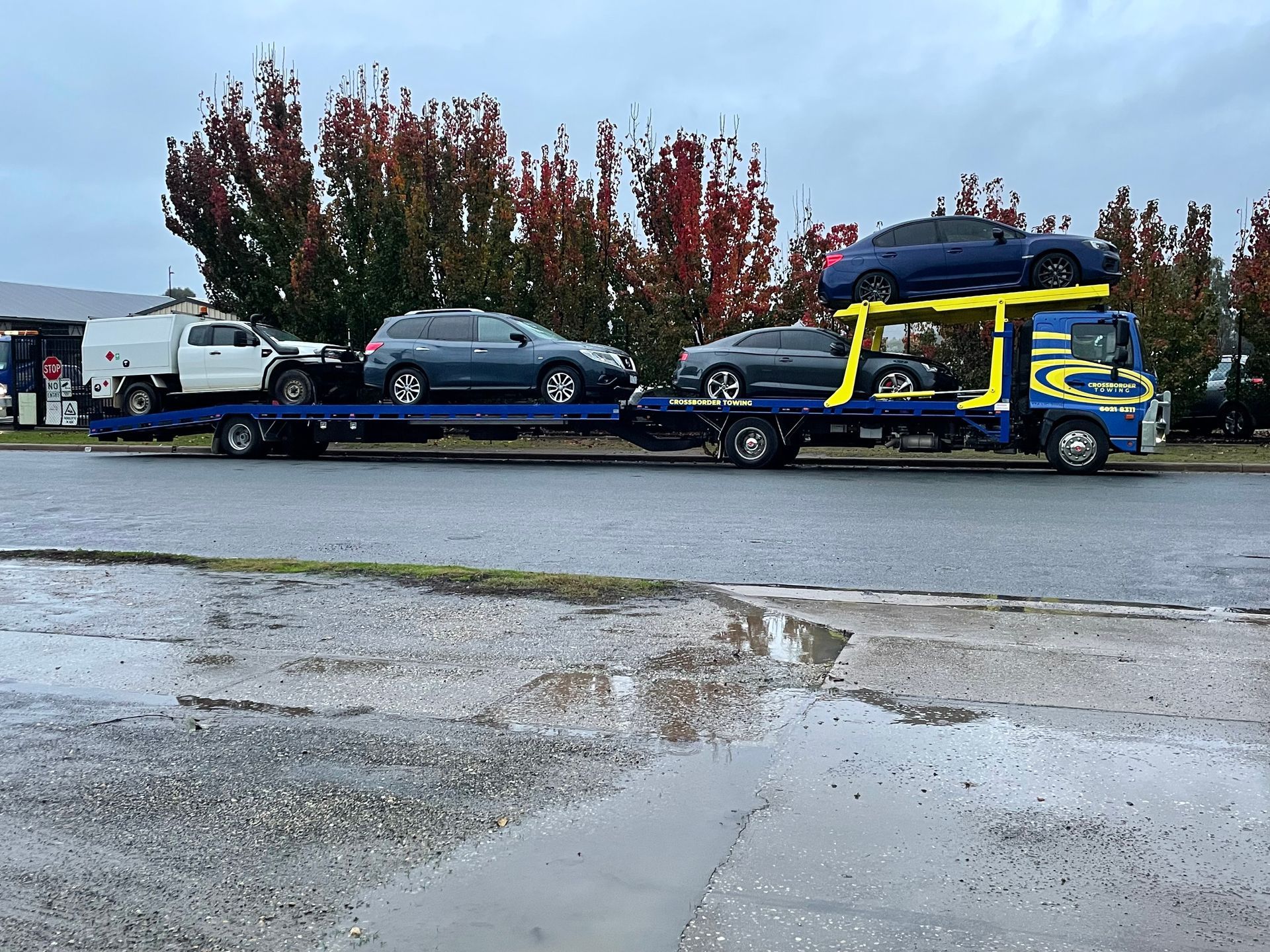 Three Cars are Being Towed by a Tow Truck — Crossborder Towing in South Albury, NSW