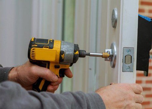 Install the Door Handle With a Lock — Bartlett, TN — EnviroUSA