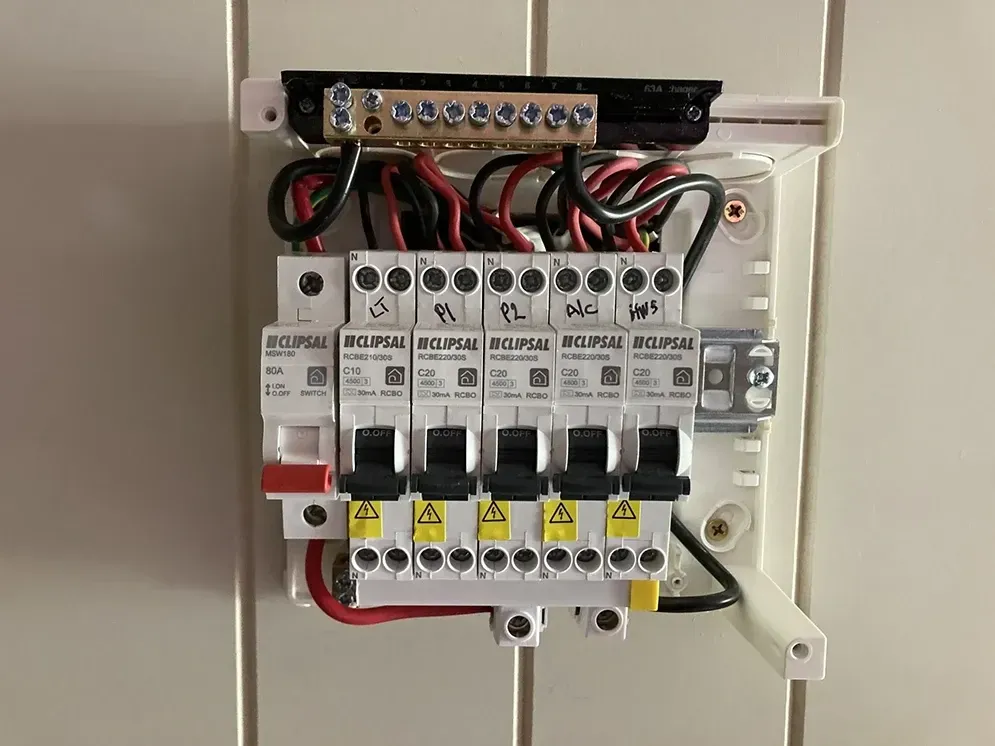 A Electrical Box With A Bunch Of Wires Coming Out Of It — Short Stop Electrical in Nerang, QLD