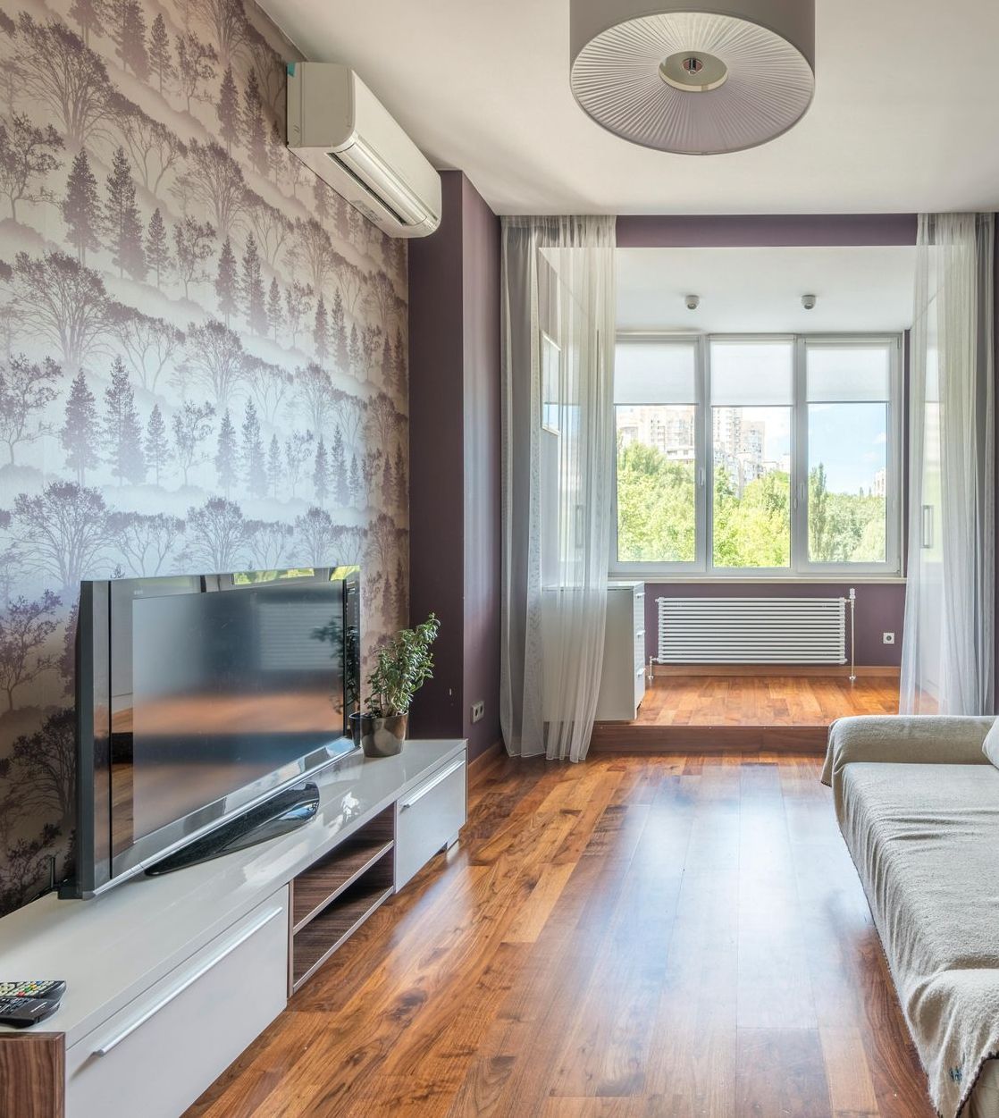 A split system air conditioner in a living room — Short Stop Electrical in Nerang, QLD