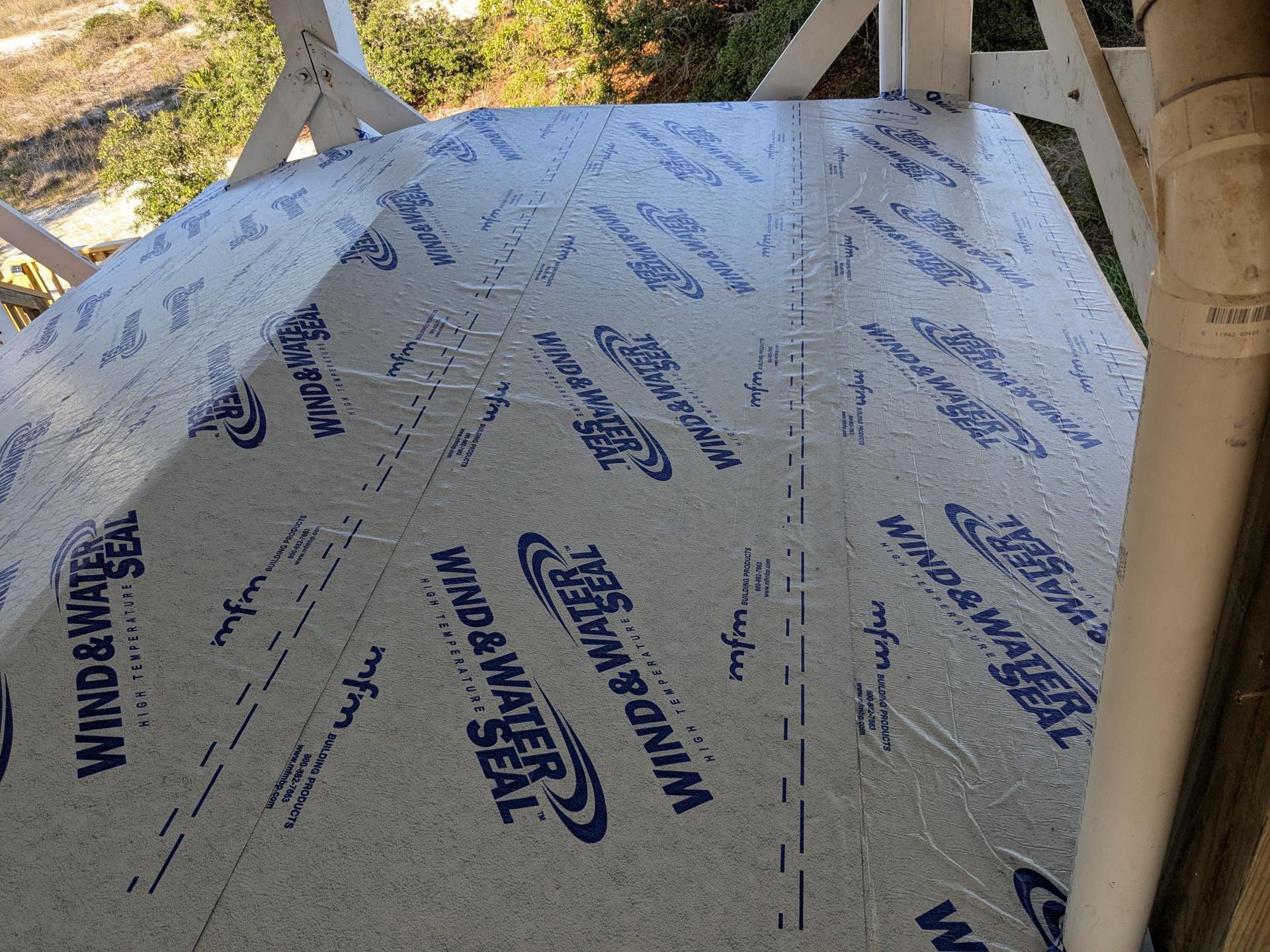 A deck covered with Wind & Water Seal material, viewed from an elevated angle.
