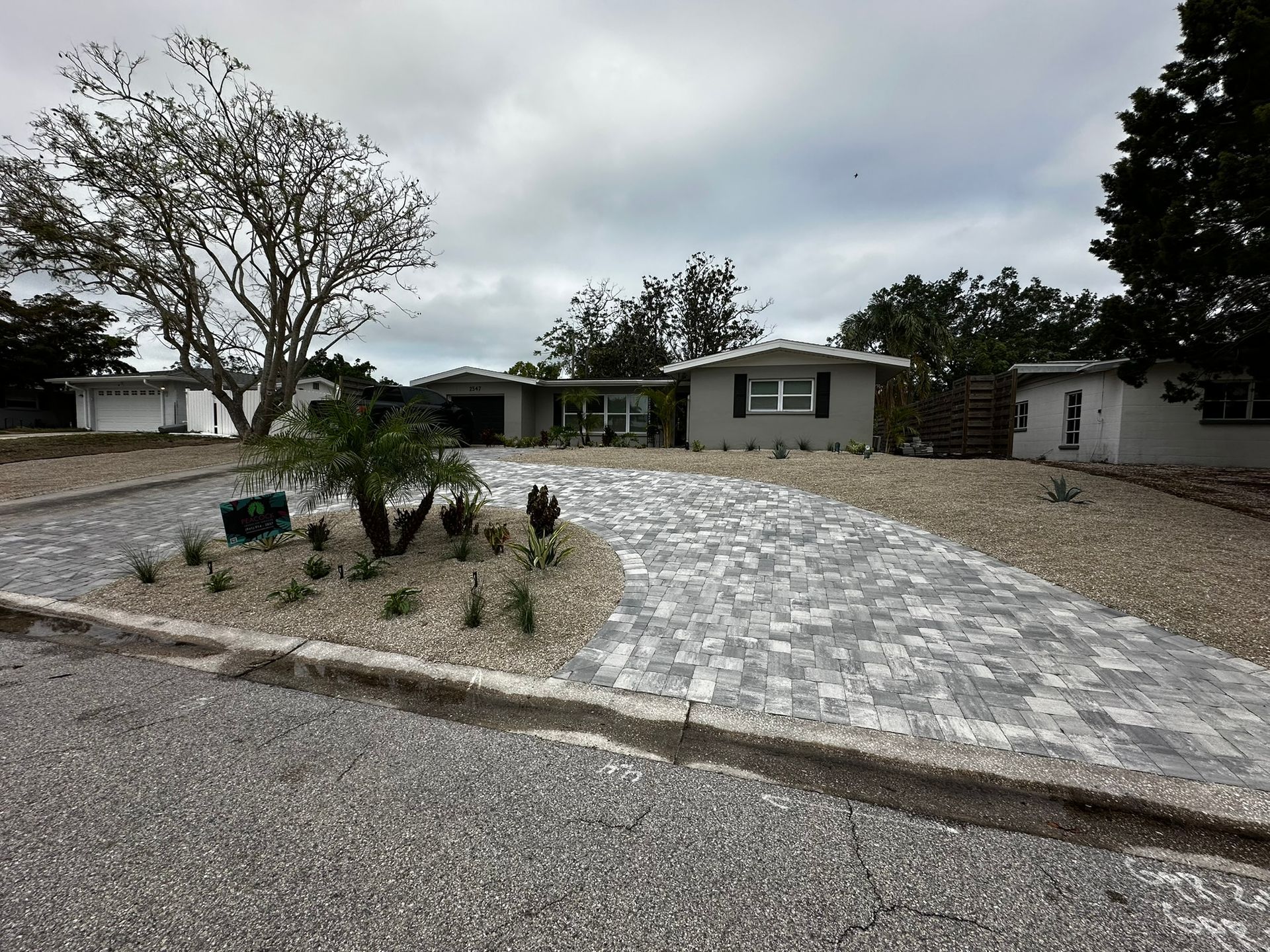 Custom hardscape and planting installation in South Gate Community, Sarasota, FL