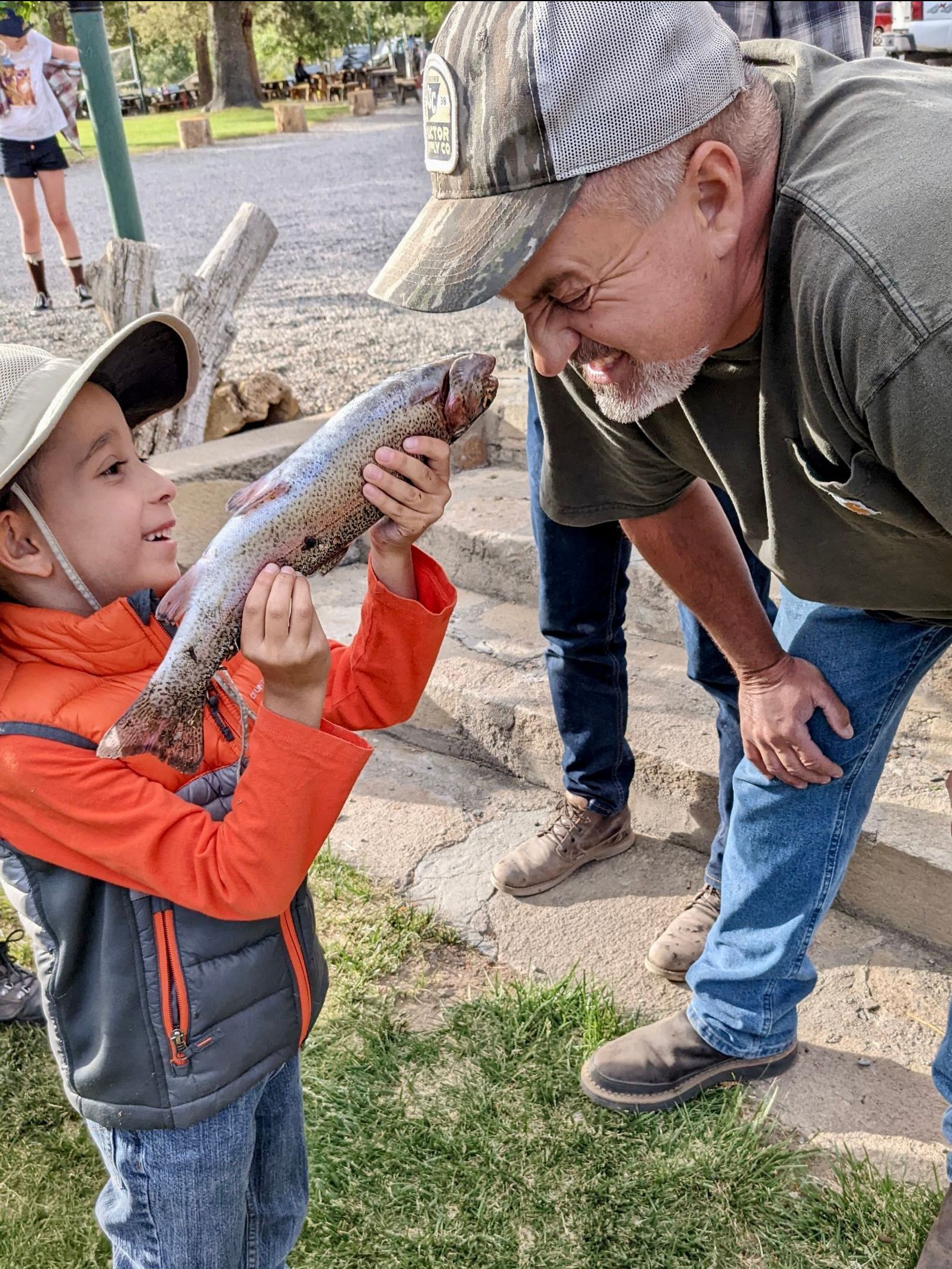 kid-and-man-with-caught-fish