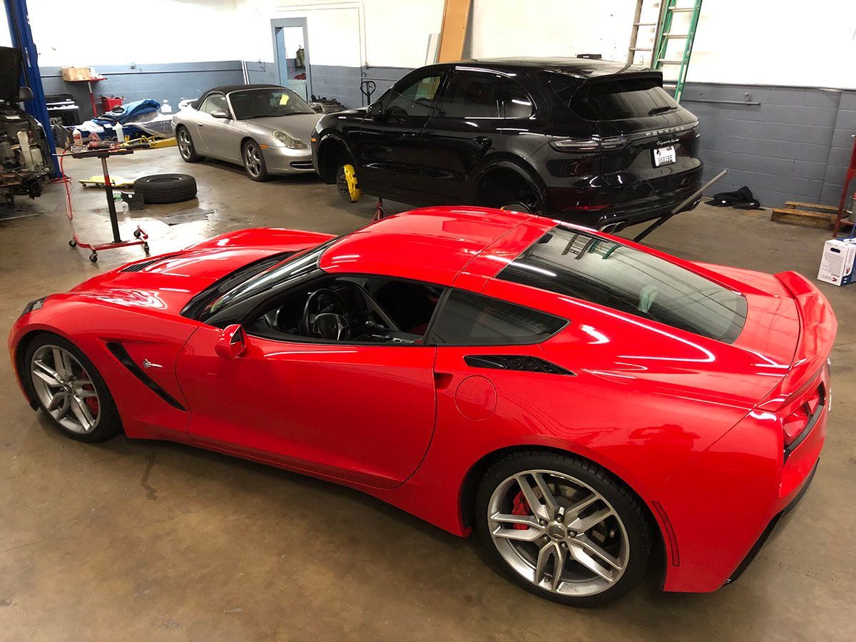 Vehicles inside of our auto repair shop | Benz Elite Automotive