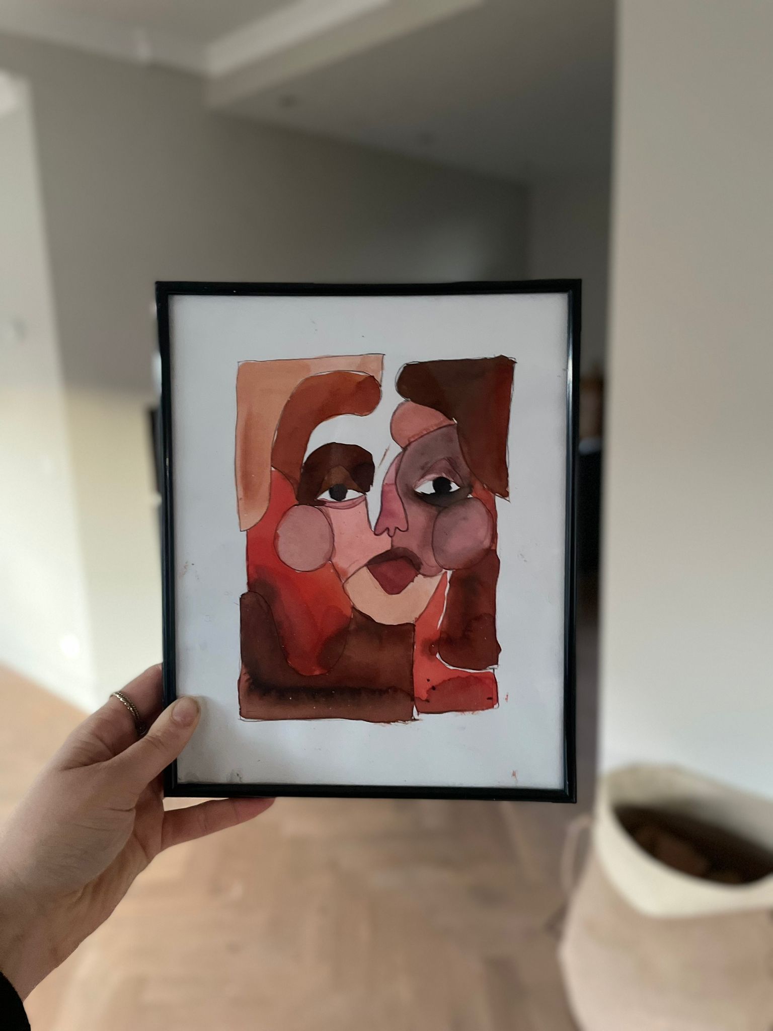 klein kunstwerkje met bordeaux kleuren. abstract portret.