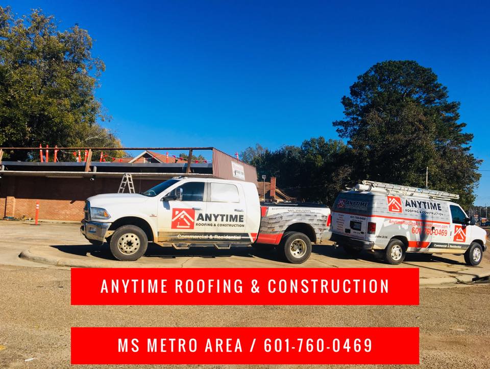 Service vehicle — Canton, MI — Anytime Roofing & Construction, LLC