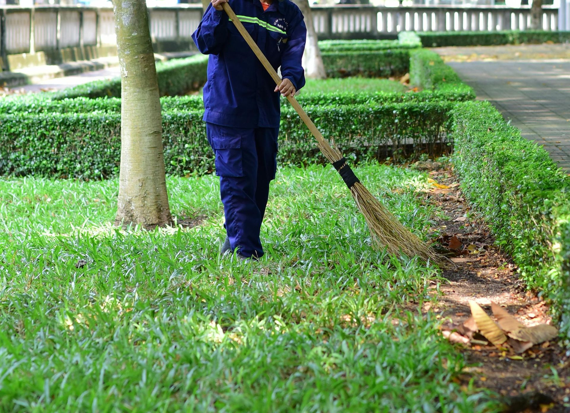 A bathroom under construction with tiles on the floor and a window.