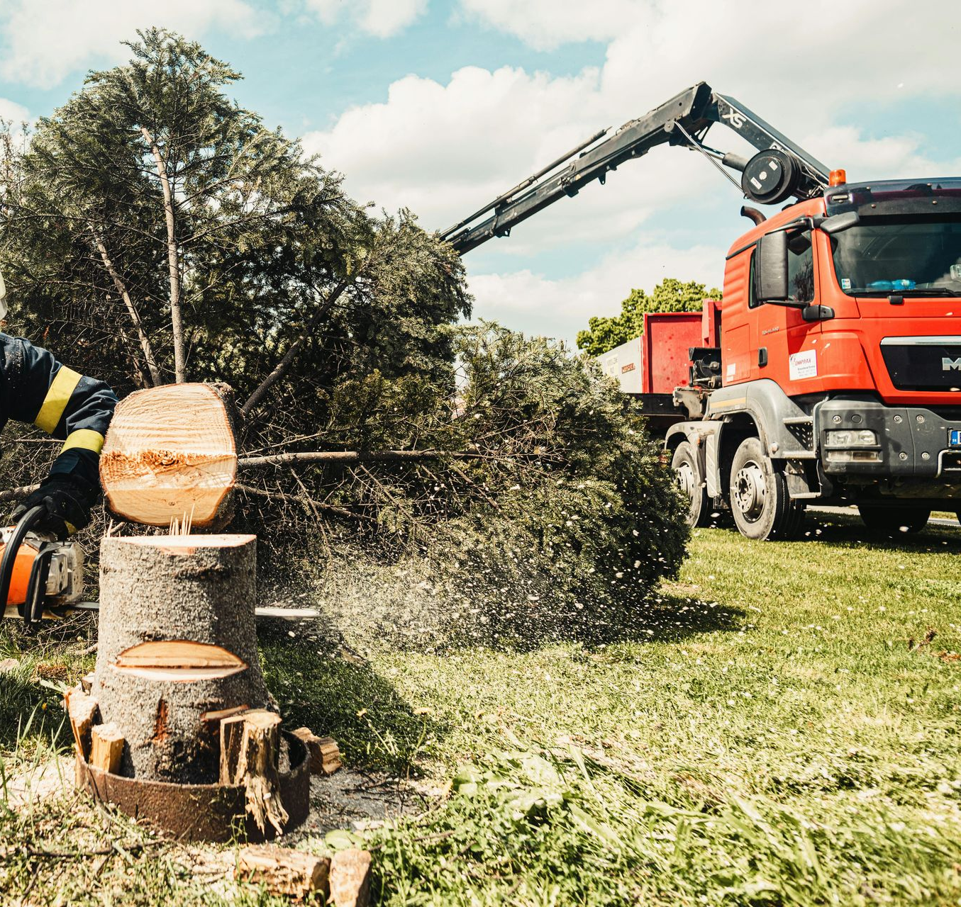 A bathroom under construction with tiles on the floor and a window.