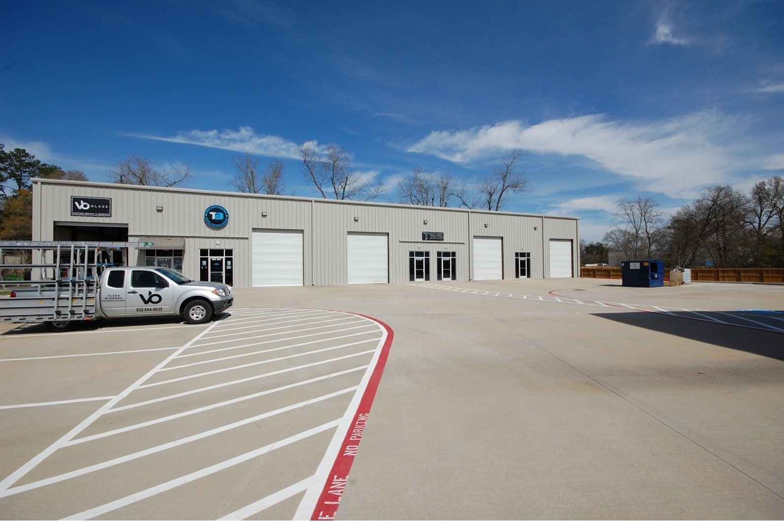 A black label commercial group logo is on a field