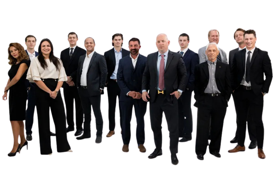 A group of people in suits and ties are posing for a picture.