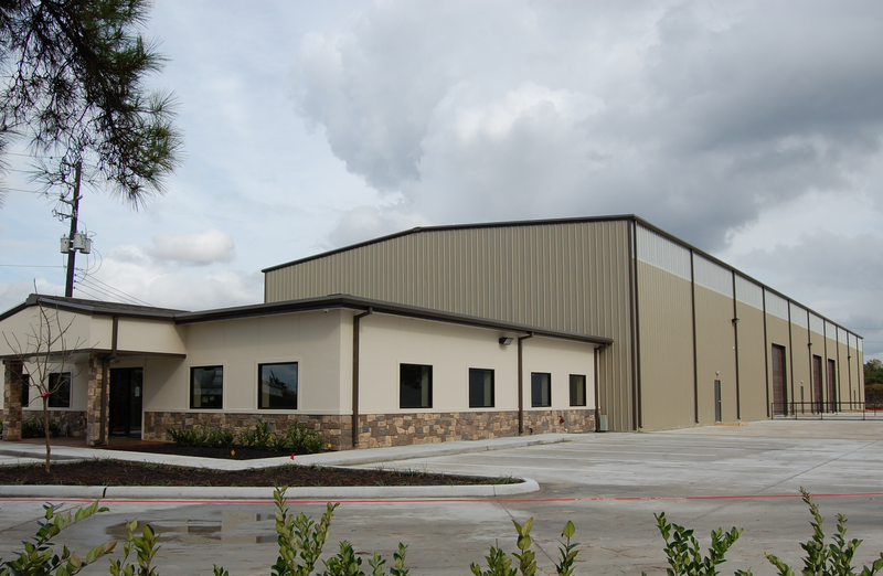 A large building with a lot of windows on a cloudy day