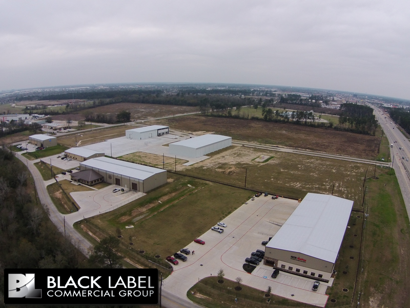 An aerial view of a commercial area owned by black label commercial group