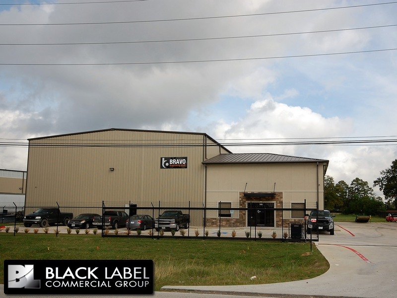 A large building with a sign that says black label commercial group