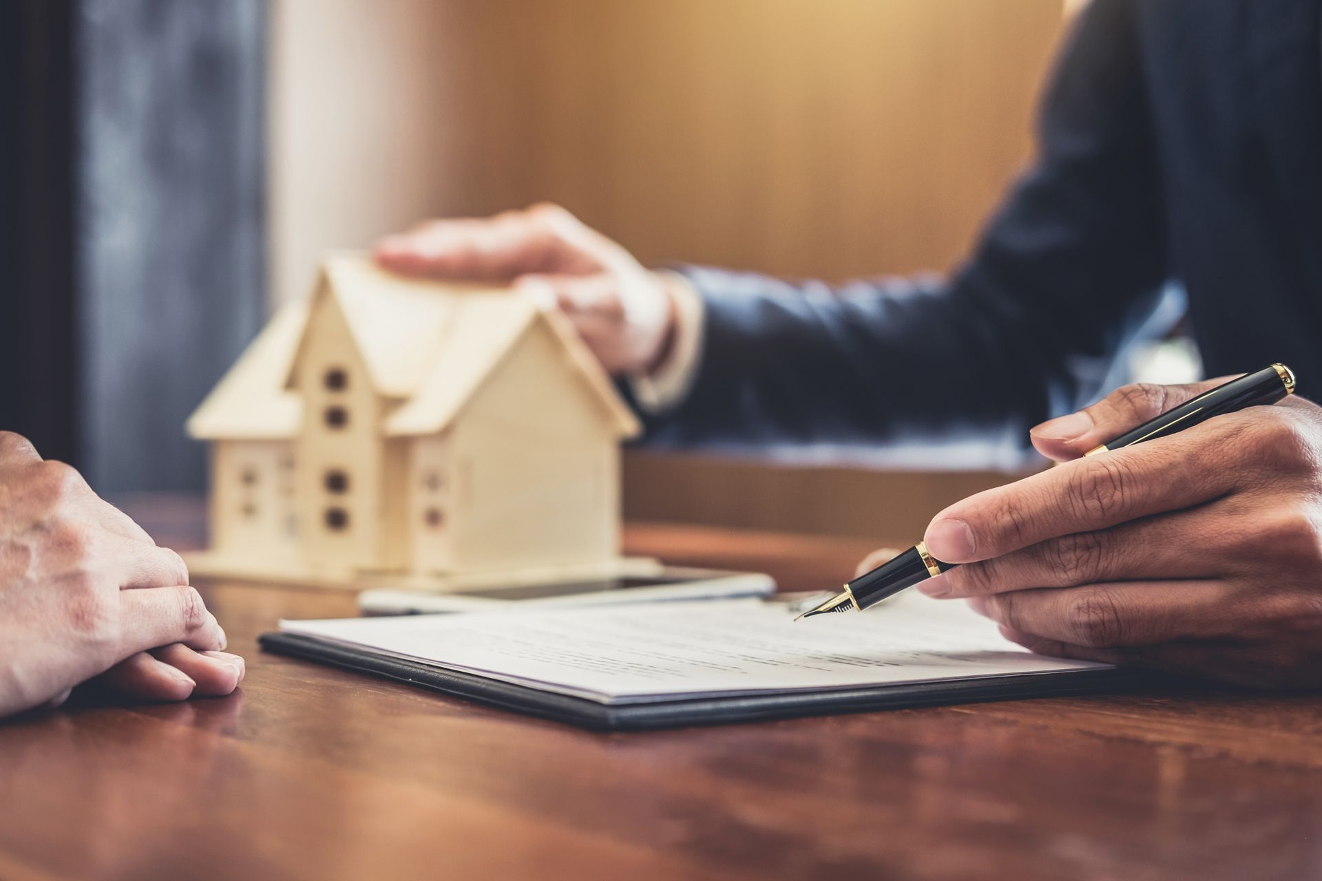 Real Estate Broker Discussing Mortgage Loan 
