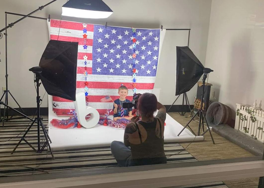 Picture Of Yvonne Portrait Princess taking a picture in her studio