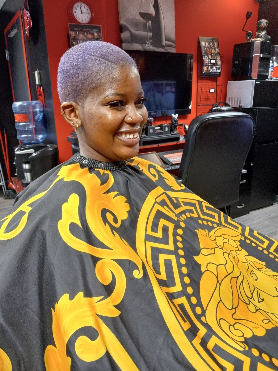 close african hairstylist braided hair afro