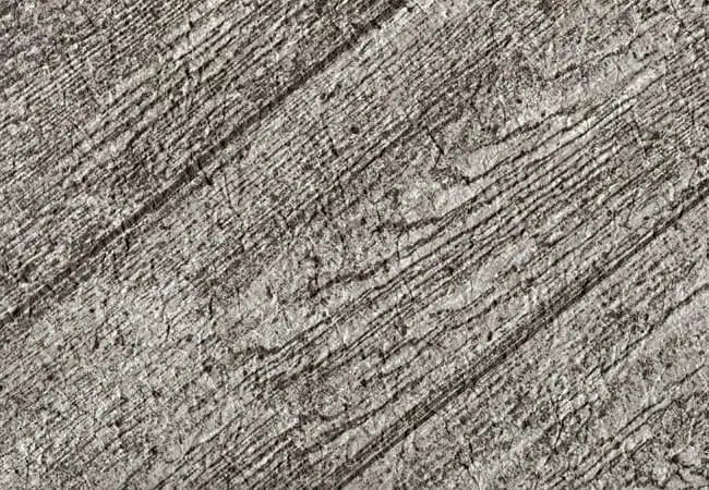 Un gros plan d'une membrane de PVC couleur planche grise rustique