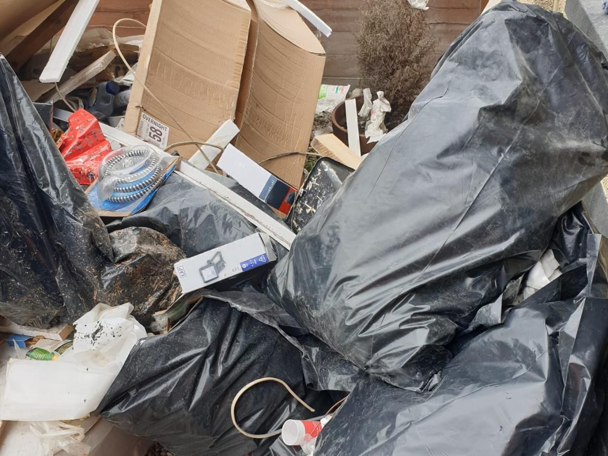 rubbish left for the house clearance company to collect in Cardiff