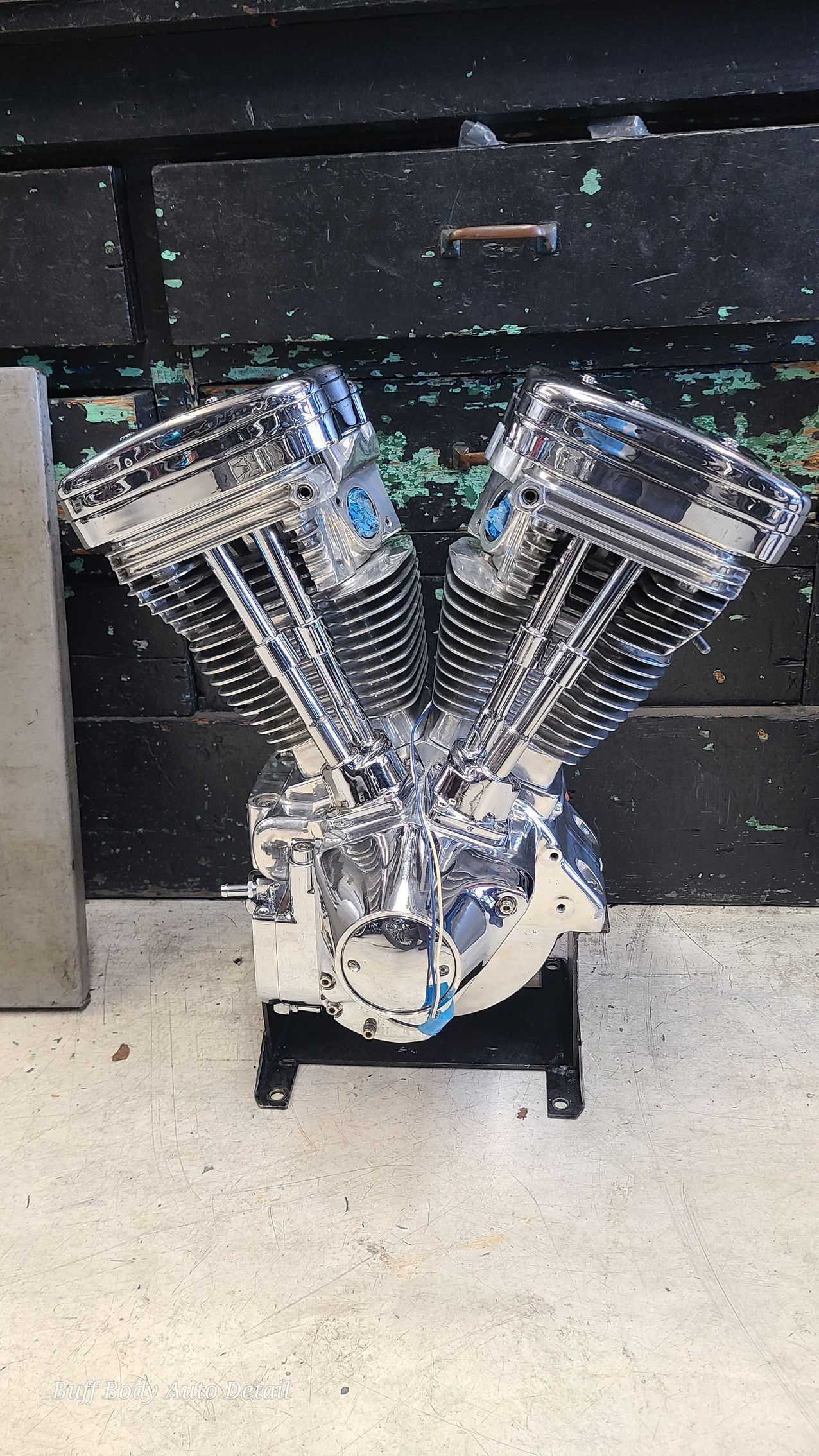 A model of a motorcycle engine is sitting on a table.