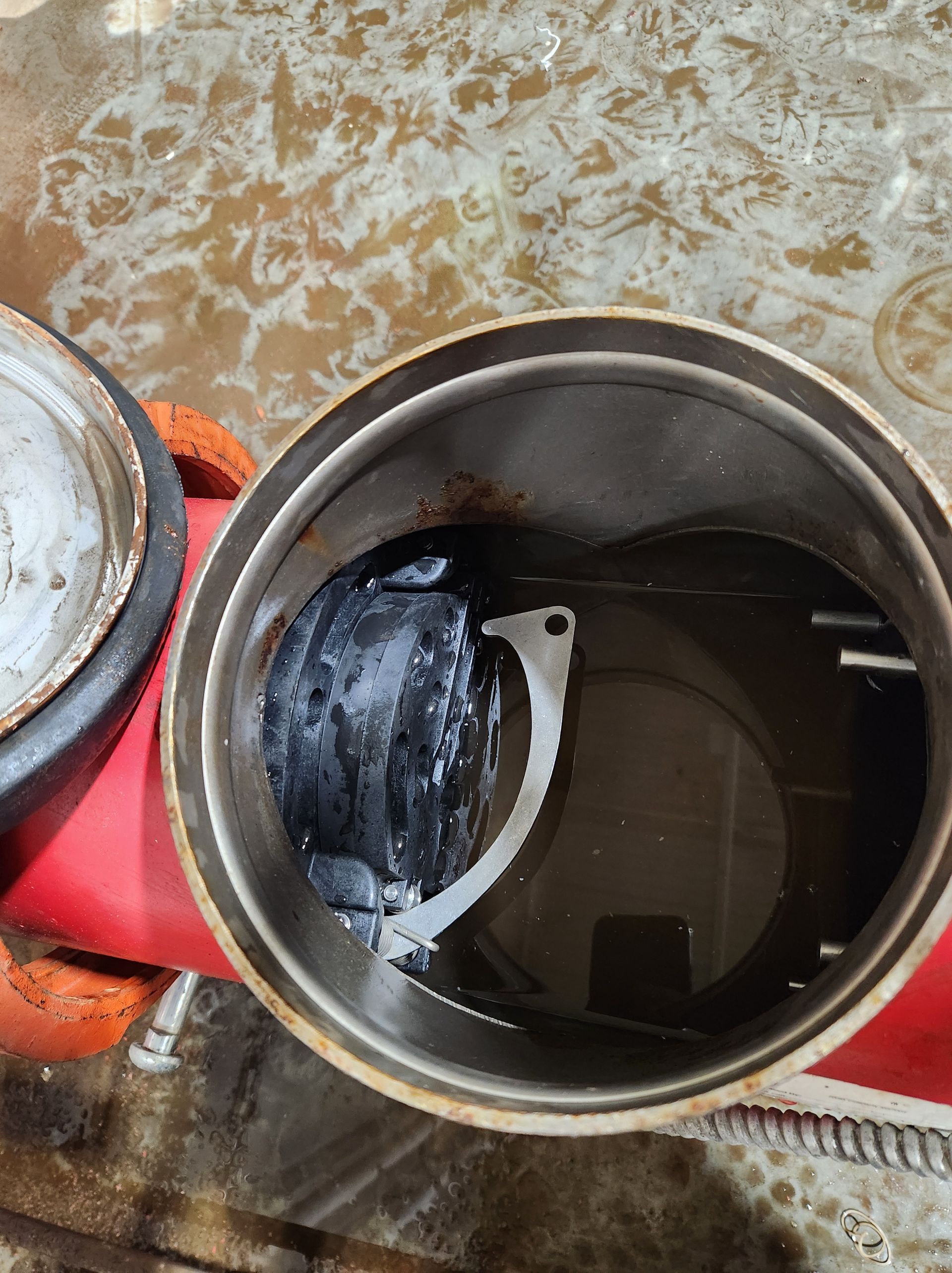 A close up of a pot filled with water on a table.
