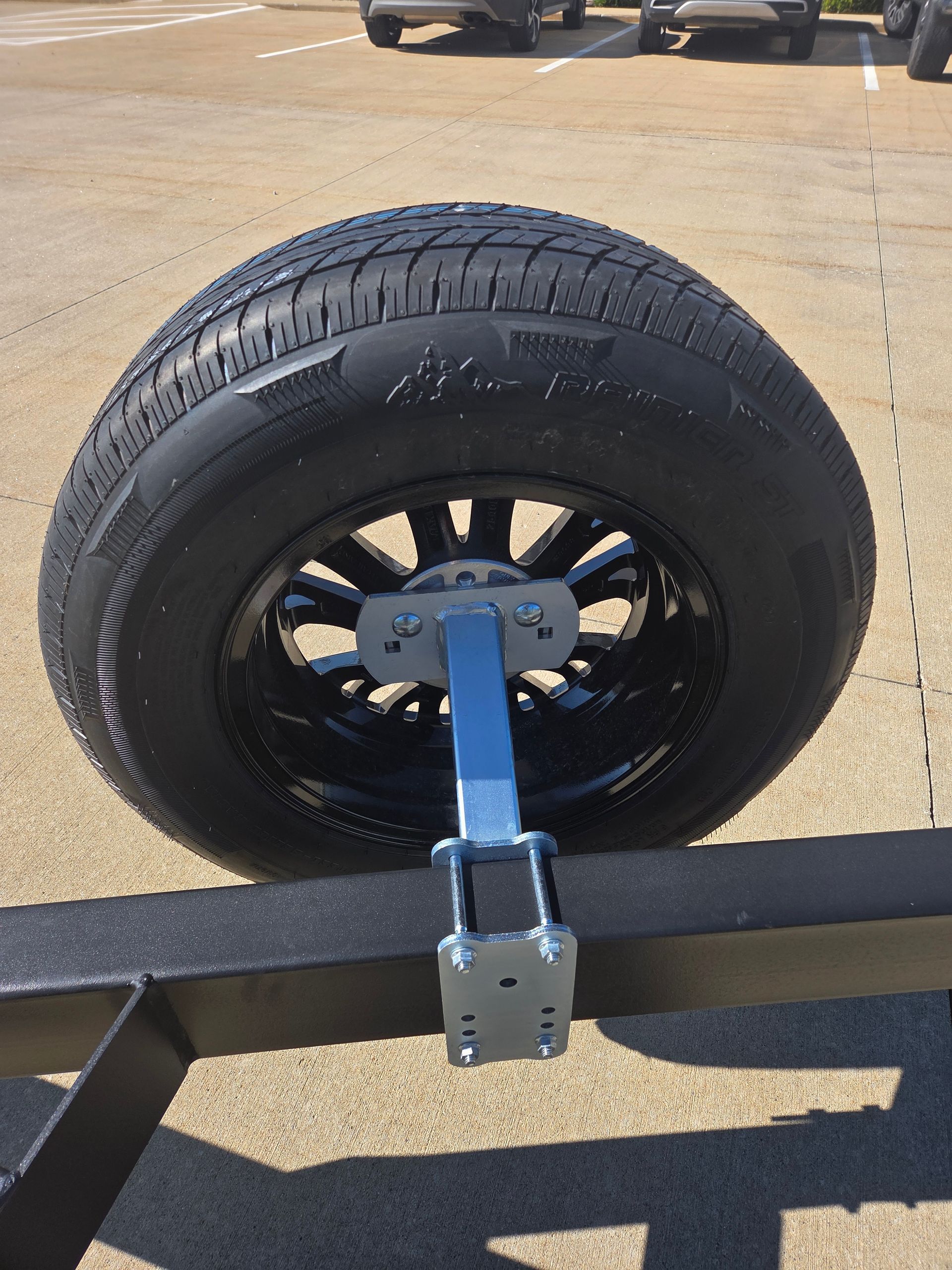 Side Mounted Spare tire carrier holding tire