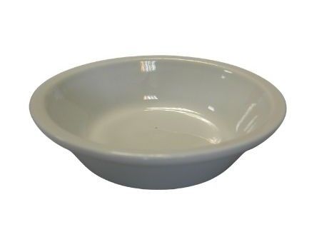 Bol en céramique blanche sur fond uni