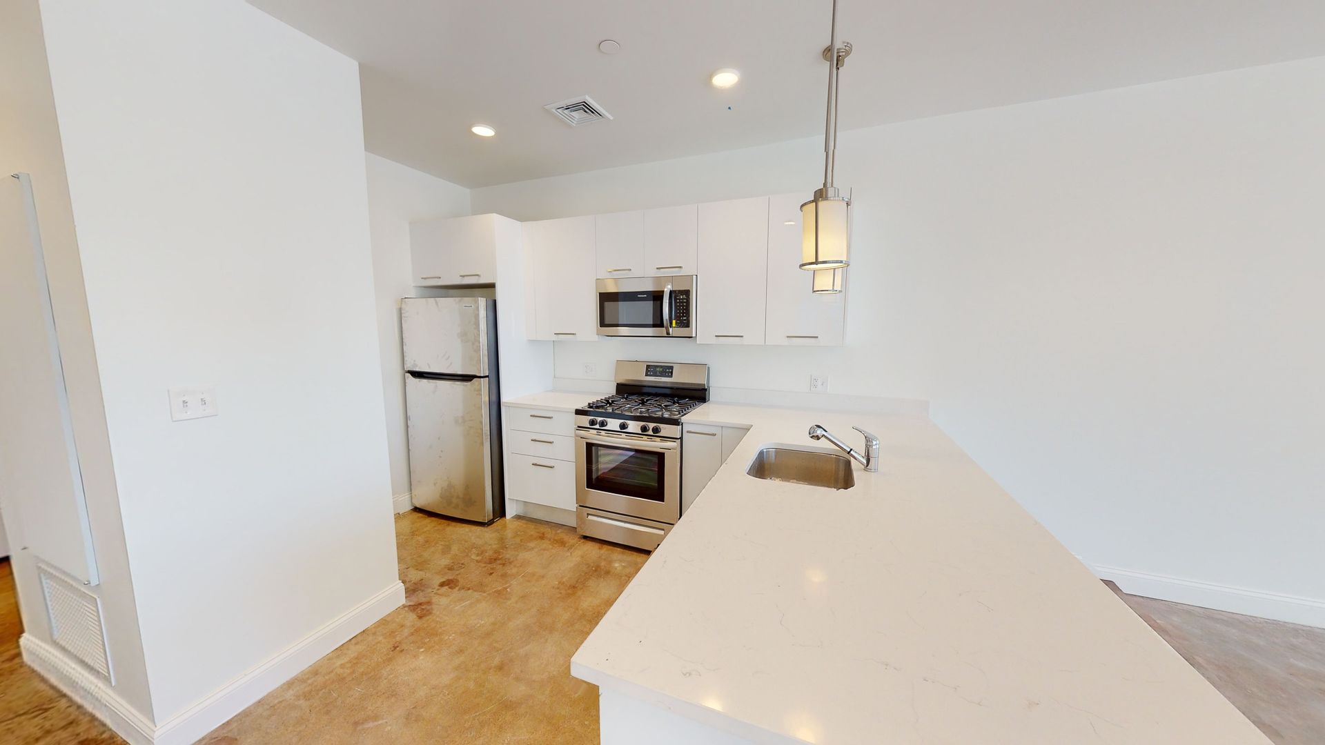 The overlook furnished kitchen with stove, microwave and fridge 02