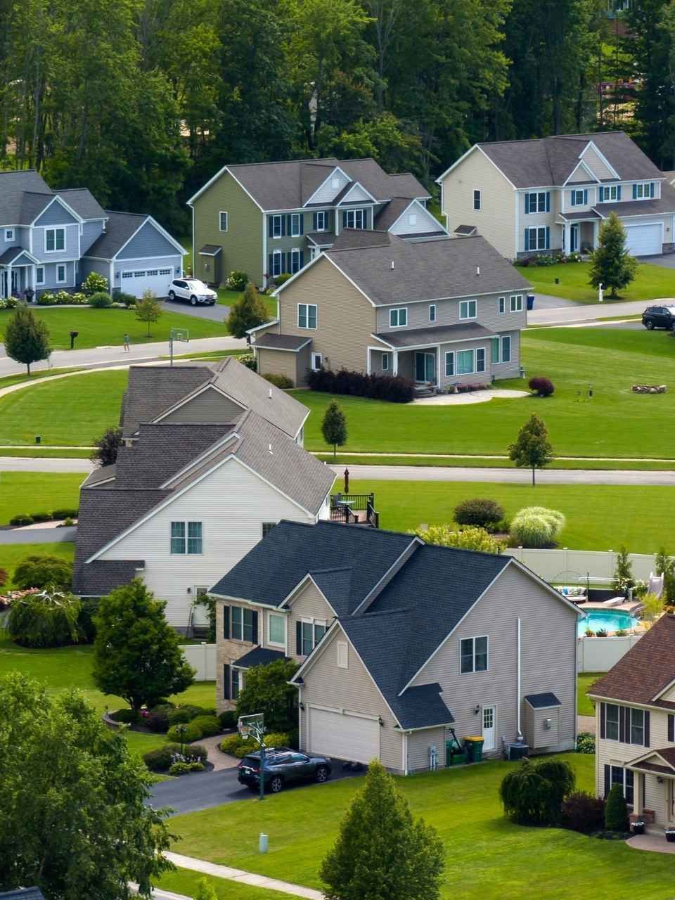 An aerial view of a residential neighborhood with lots of houses