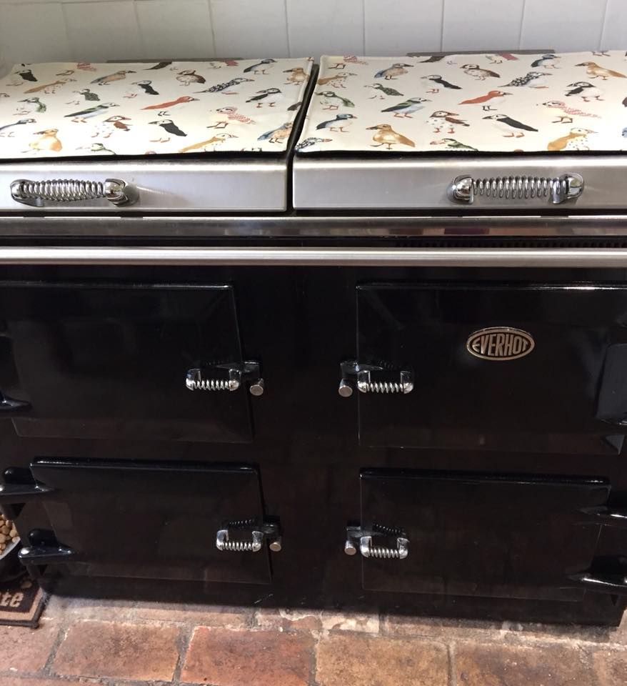 A black stove with the word gward on it