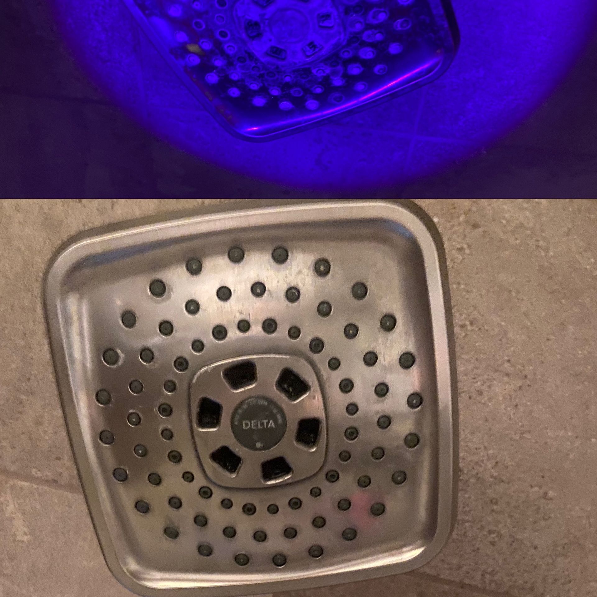 A stainless steel shower head is glowing in the dark.