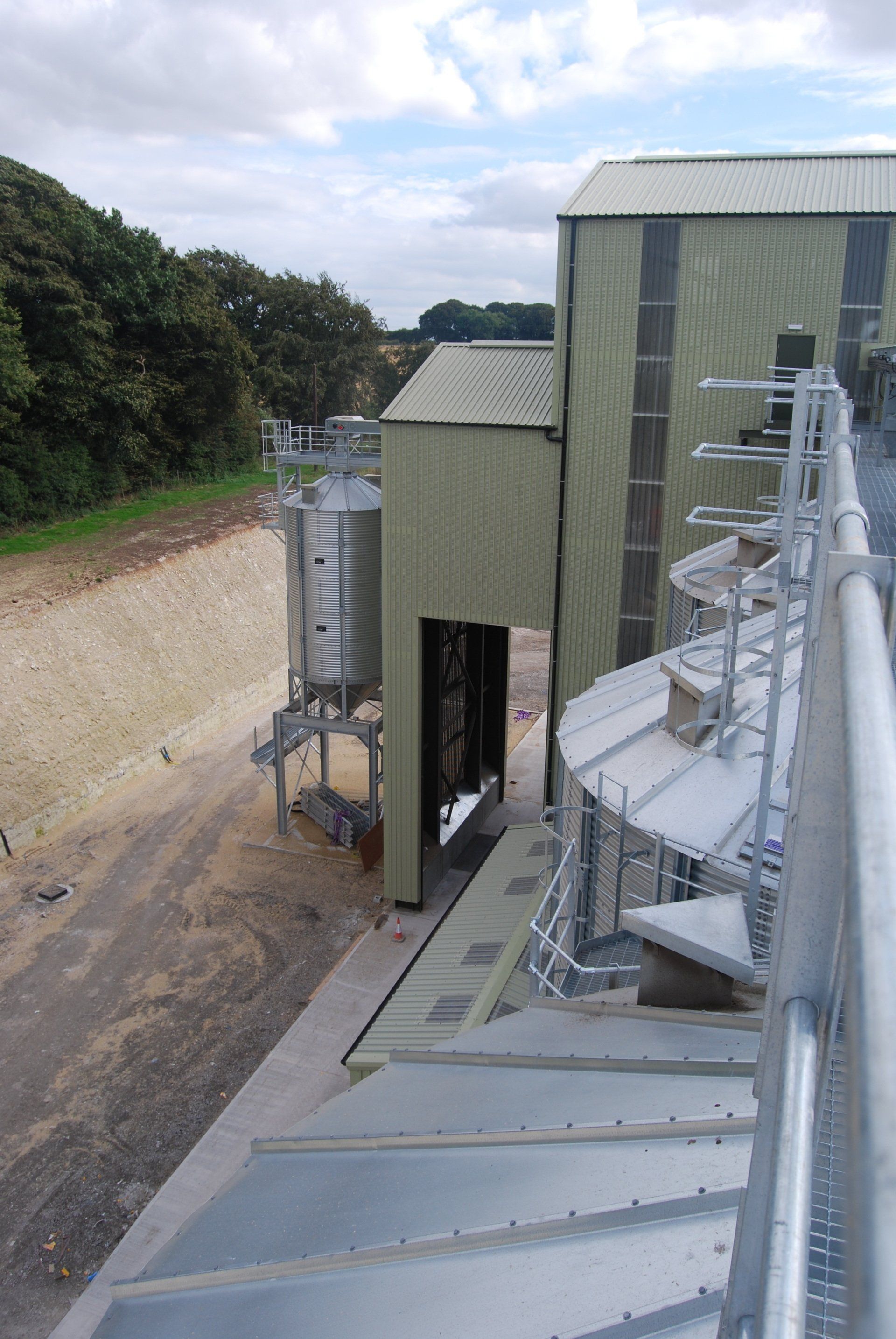 An aerial view of a large building with stairs leading up to it.