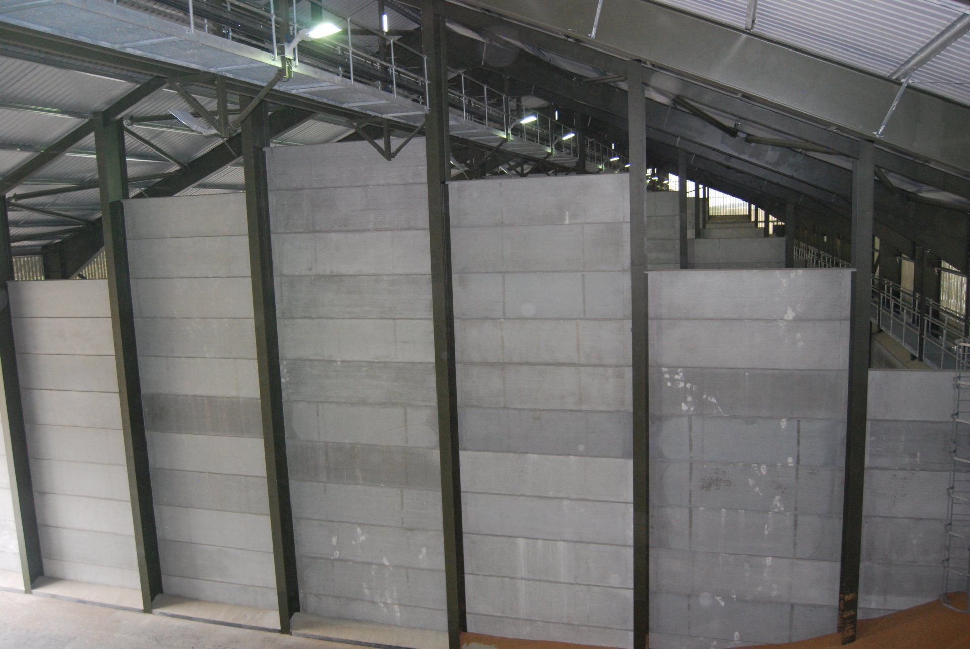 A building with a lot of concrete walls and pillars