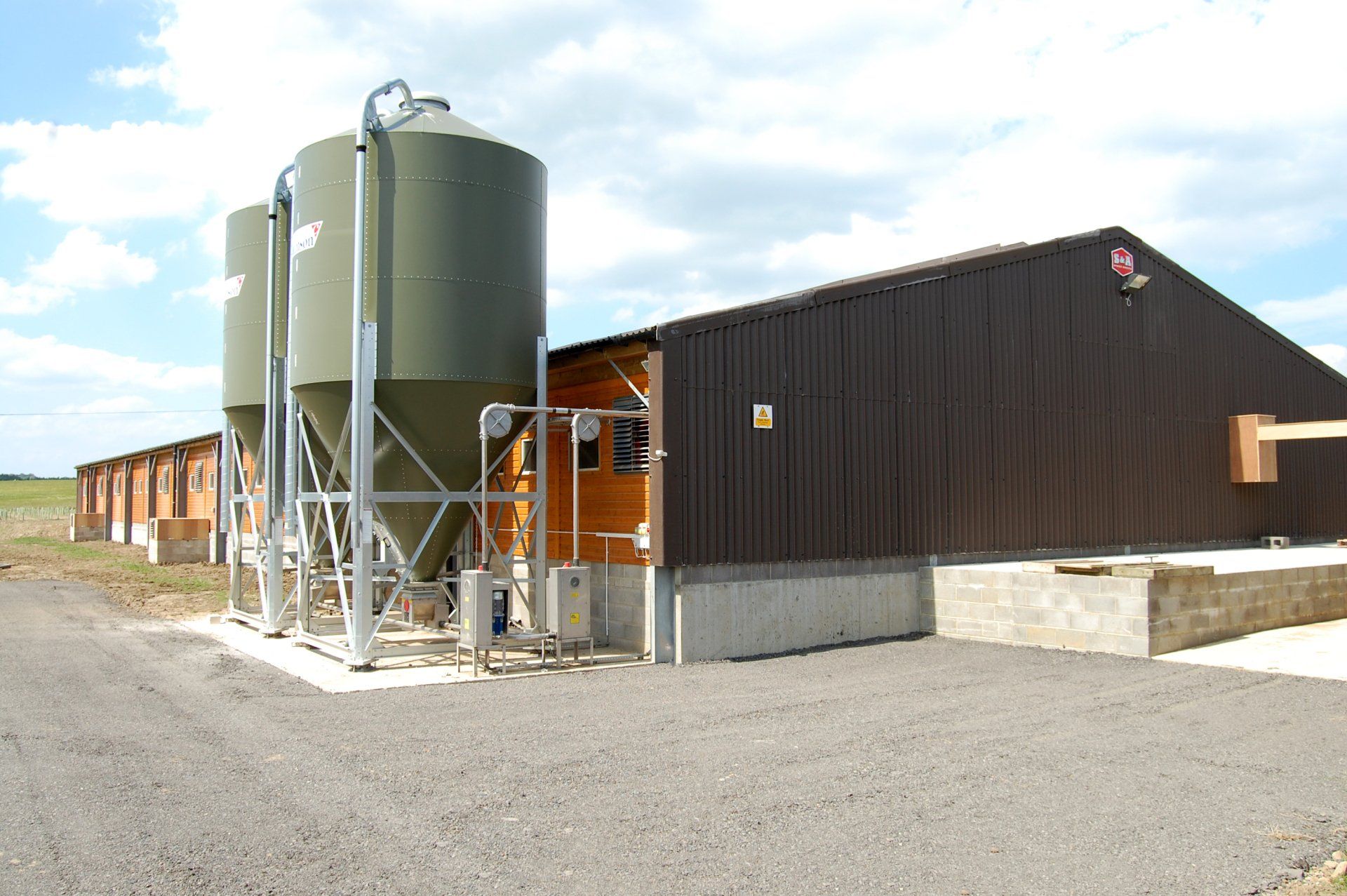 A building with a lot of silos in front of it