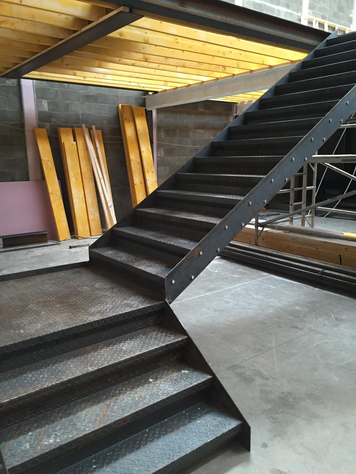 A set of stairs in a building under construction.