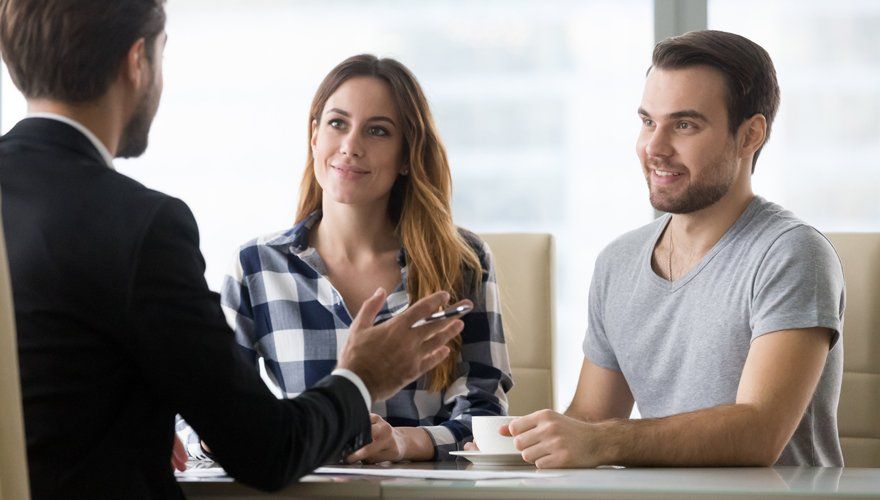 Man Making Presentation Offer To Clients At Meeting — Kernersville, NC — Hodges Triad Electric Co LLC