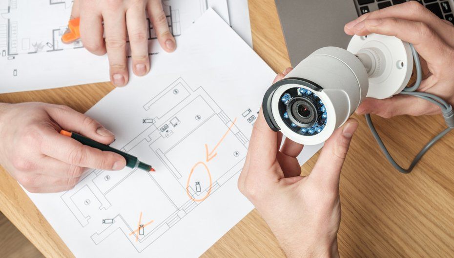 Two People Discussing CCTV Project — Kernersville, NC — Hodges Triad Electric Co LLC