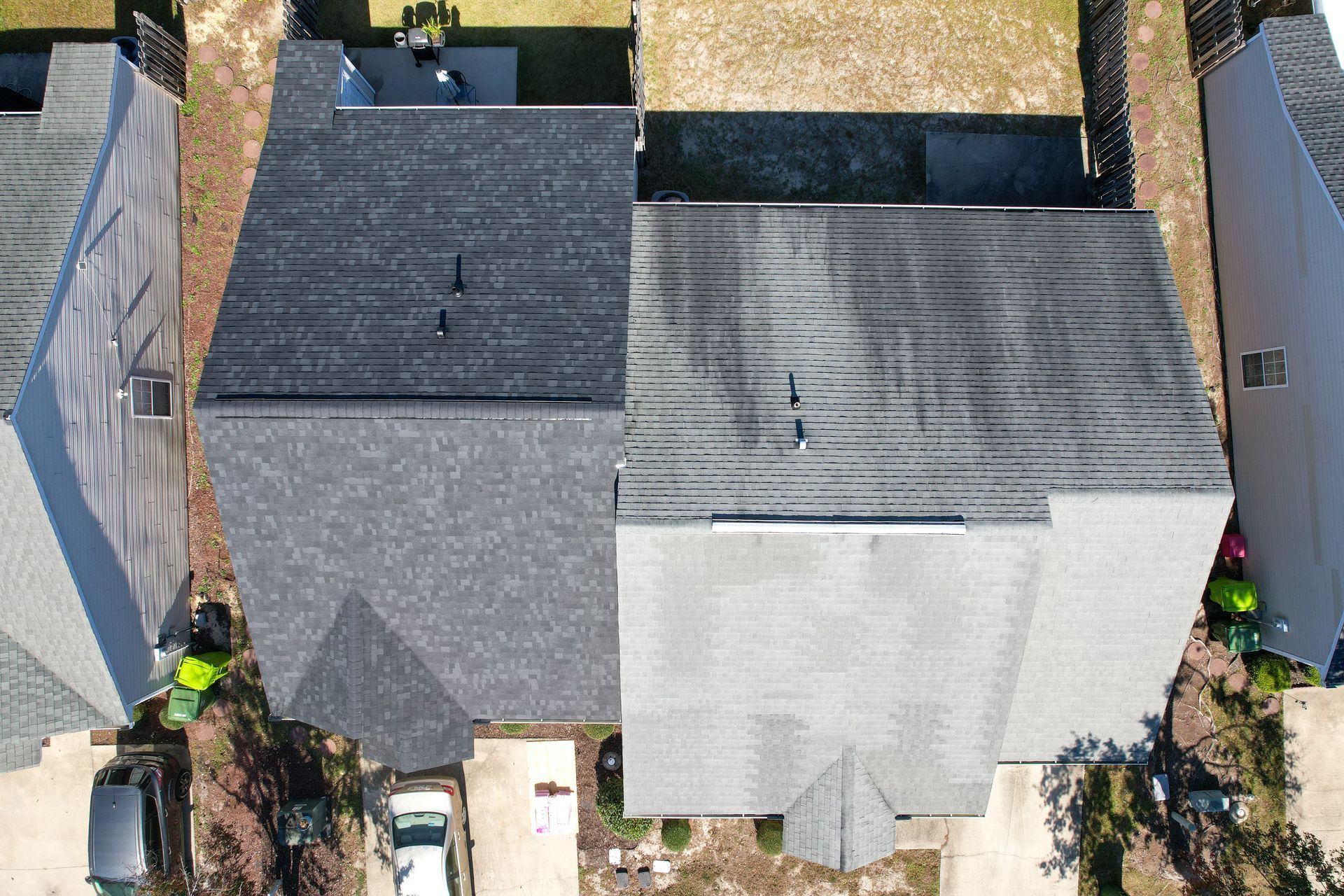 An aerial view of a row of houses in a residential area.