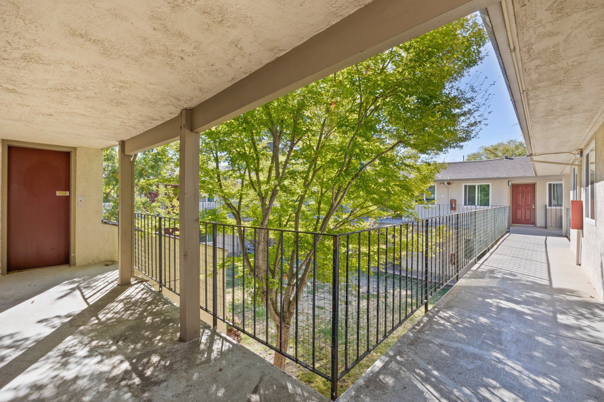 Exterior view of Kings and Queens Apartments building.