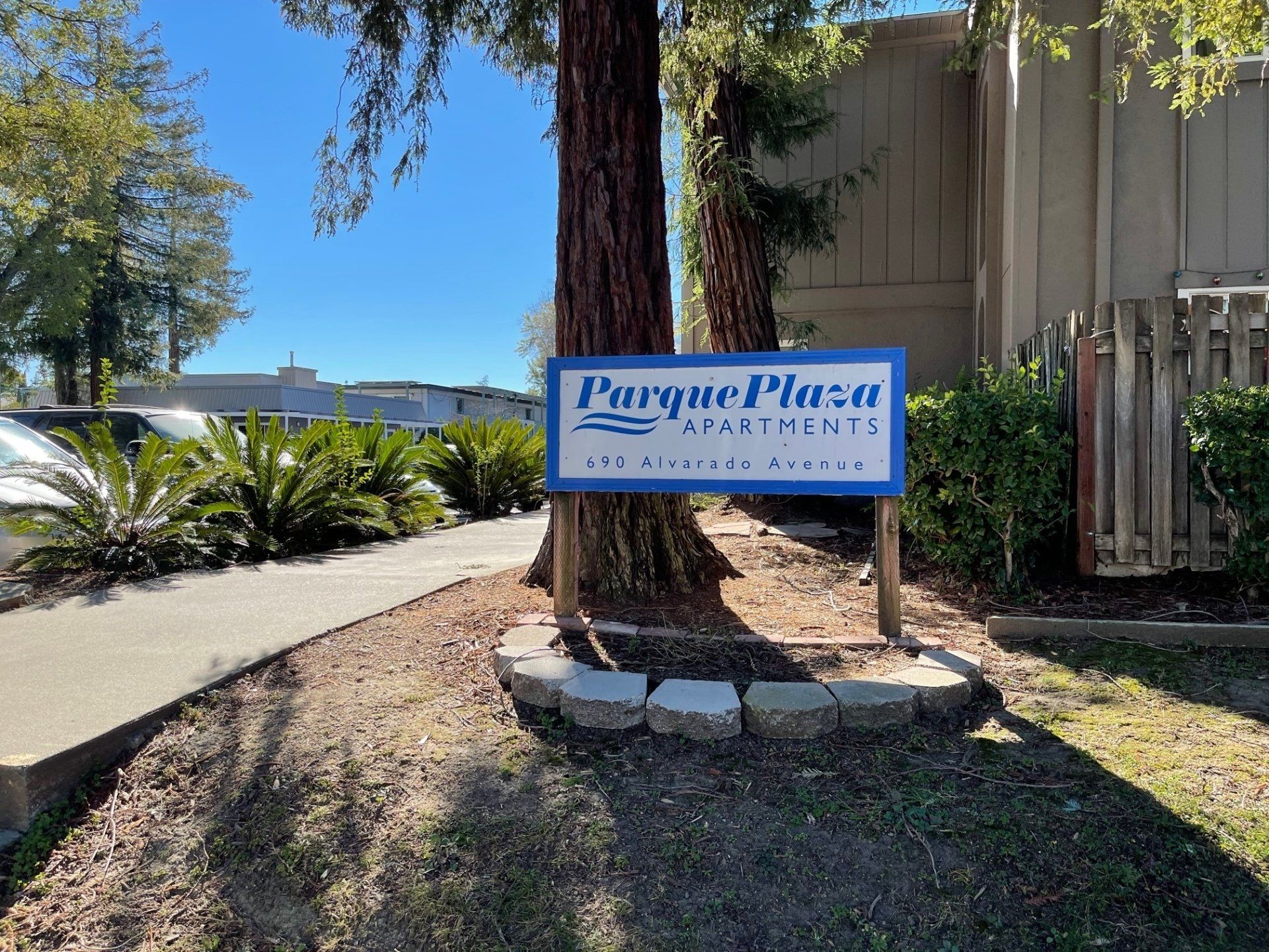 Parque Plaza Apartments building and sign